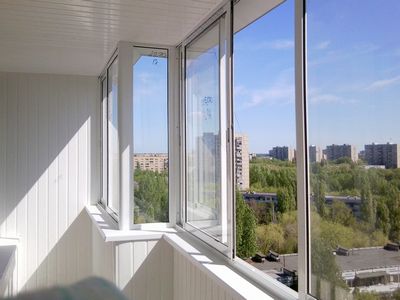 Отделка балконов панелями ПВХ